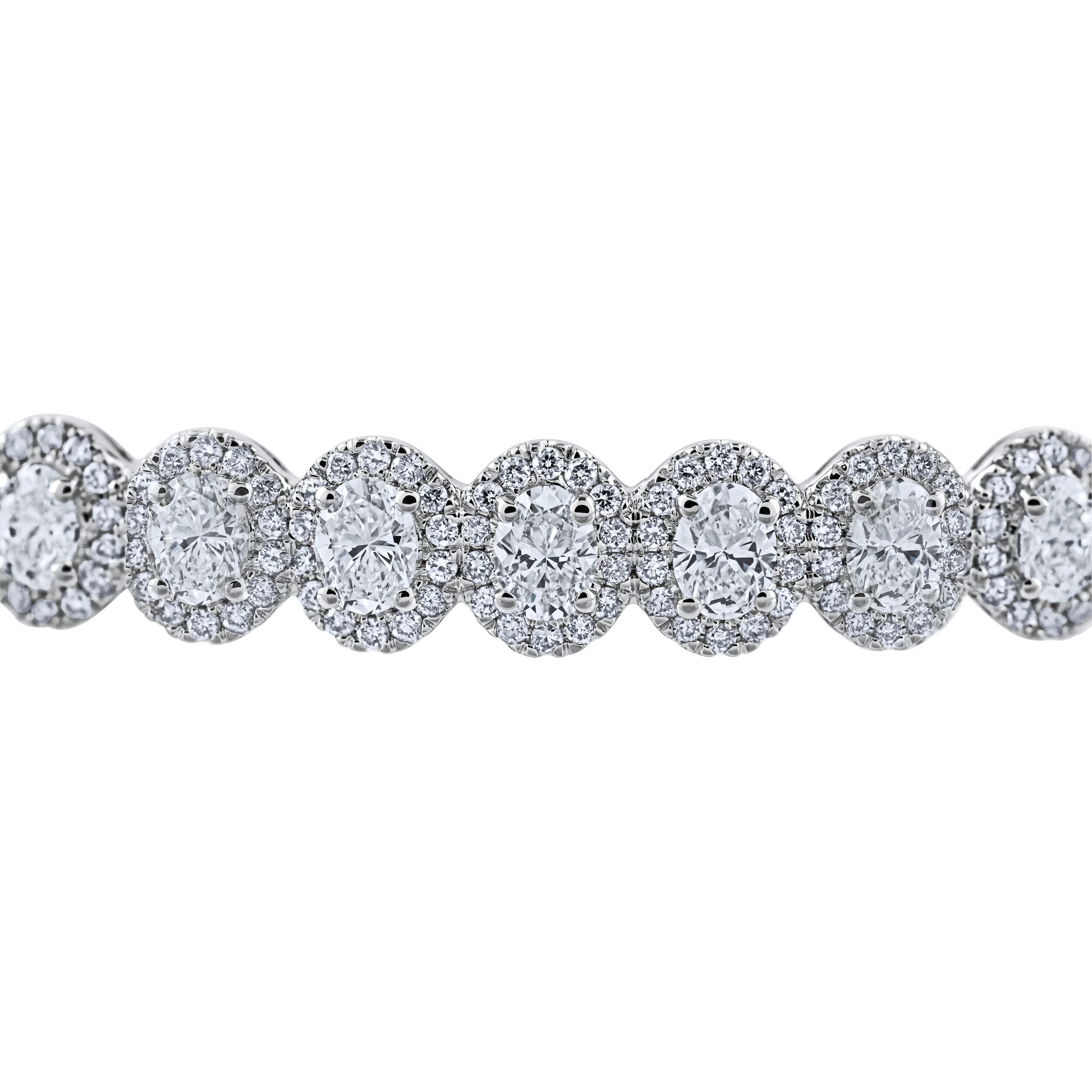 Bangle: 14KW Oval Halo's 225 Dias. 3.00 Ctw