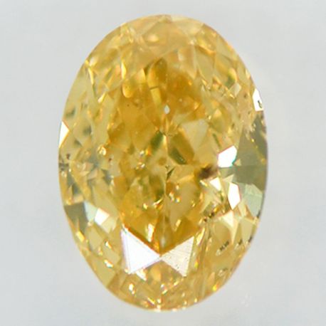 Oval Cut Diamond Fancy Brown Yellow Color 0.61 Carat SI1 IGI Certificate