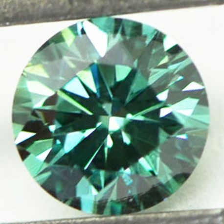 Round Diamond Fancy Green Color 0.58 Carat VS1