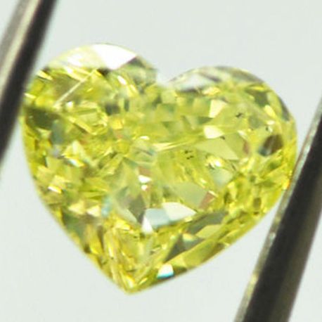 Loose Heart Diamond Fancy Yellow 0.76 Carat VS2