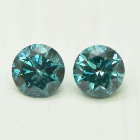 Loose Matching Pair Blue Round Diamonds 0.81 TCW