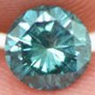 Loose Round Shape Diamond Fancy Blue Color 0.79 Carat Enhanced SI1 Certified
