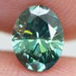 Fancy Green Oval Diamond 0.71 Carat VS2